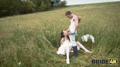 BRIDE4K. Pretty brunette bride fucks a horny shepherd in a summer field